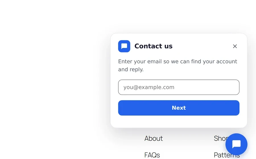 The visitor-facing contact card asking only for an email address, with its Next button and the round launcher in the page corner.